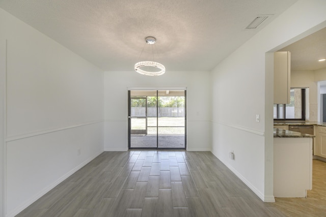 1168 SE Clifton Ln, Port Saint Lucie, FL 34983 - ranch-style house featuring concrete driveway, a garage, and stucco siding