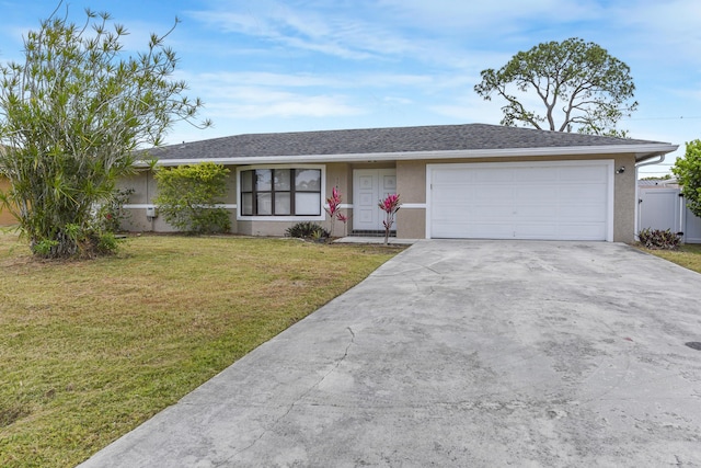 1168 SE Clifton Ln, Port Saint Lucie, FL 34983 - kitchen featuring appliances with stainless steel finishes, white cabinetry, baseboards, a peninsula, and dark stone countertops