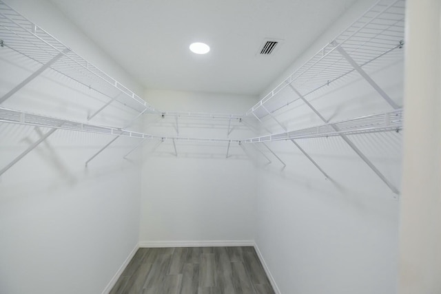 1168 SE Clifton Ln, Port Saint Lucie, FL 34983 - walk in closet with wood finished floors