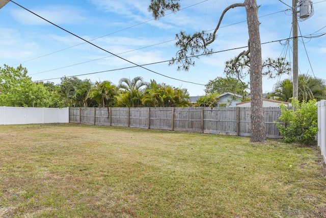1168 SE Clifton Ln, Port Saint Lucie, FL 34983 - unfurnished room featuring a textured ceiling, wood finished floors, and baseboards