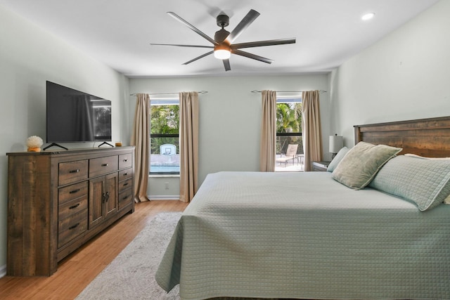 bedroom featuring recessed lighting, baseboards, light wood finished floors, and ceiling fan