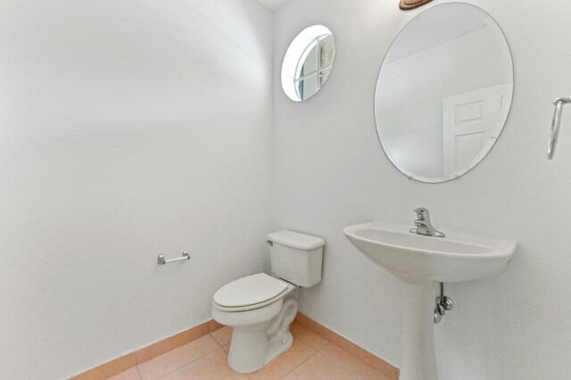 3119 N Evergreen Cir, Boynton Beach, FL 33426 - bathroom featuring toilet, tile patterned flooring, and baseboards