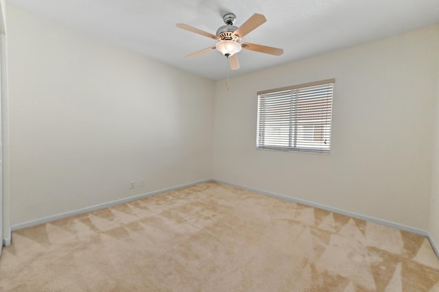 3119 N Evergreen Cir, Boynton Beach, FL 33426 - carpeted spare room with baseboards and a ceiling fan