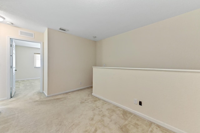 3119 N Evergreen Cir, Boynton Beach, FL 33426 - empty room featuring baseboards and light carpet