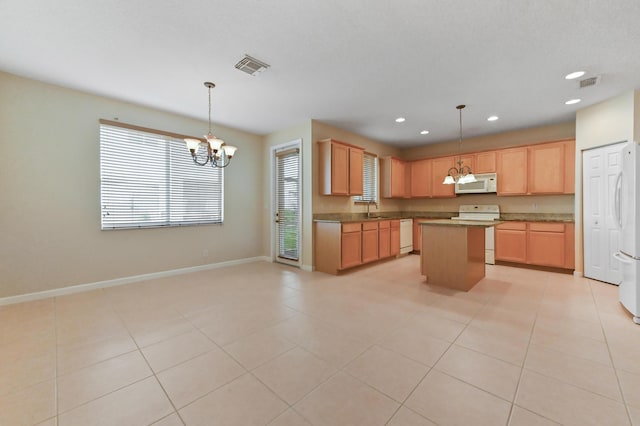 3119 N Evergreen Cir, Boynton Beach, FL 33426 - kitchen featuring white appliances, a chandelier, a sink, baseboards, and recessed lighting