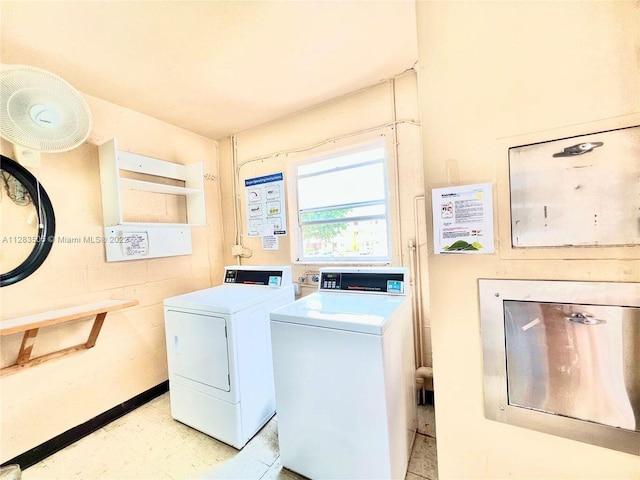 shared laundry area featuring washer and dryer