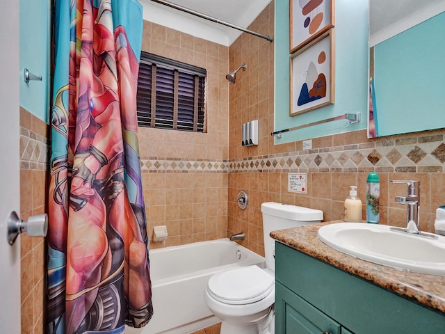 bathroom with toilet, vanity, tile walls, and shower / bath combo
