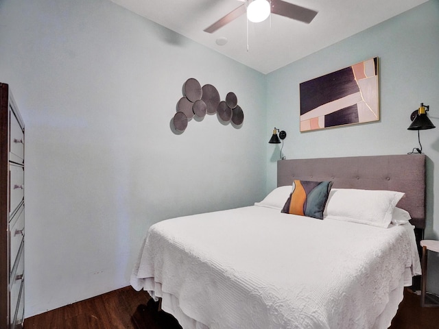bedroom with ceiling fan and wood finished floors