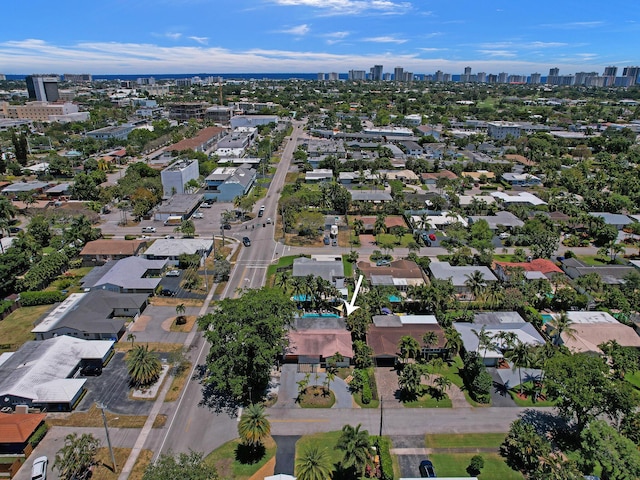 birds eye view of property featuring a city view