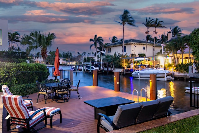 702 SE 7th St, Delray Beach, FL 33483 - dock area with a water view and outdoor dining space