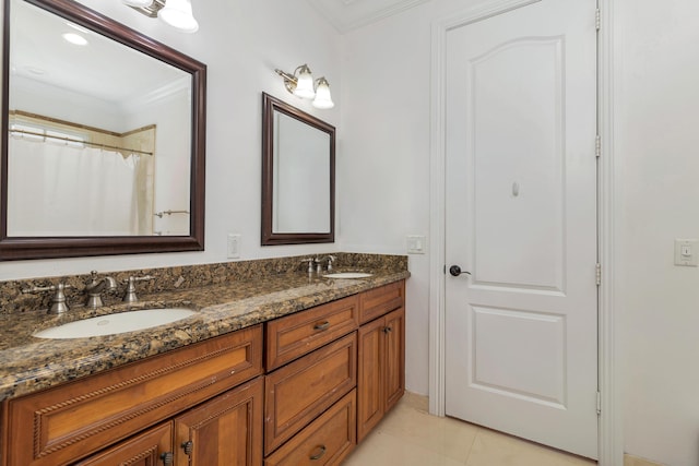 702 SE 7th St, Delray Beach, FL 33483 - full bathroom featuring ornamental molding, double vanity, and tile patterned flooring