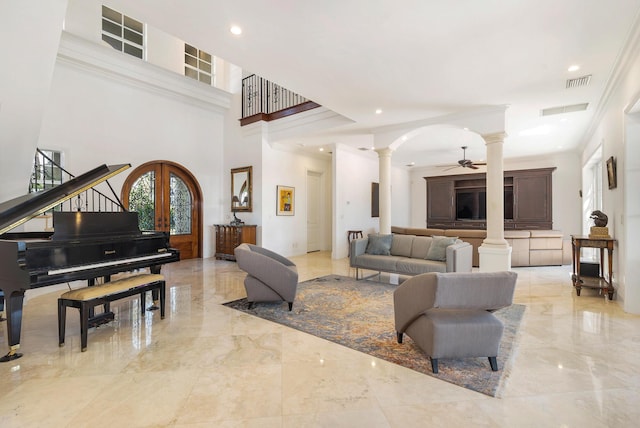 702 SE 7th St, Delray Beach, FL 33483 - living area featuring decorative columns, light marble finish floors, a ceiling fan, recessed lighting, and crown molding