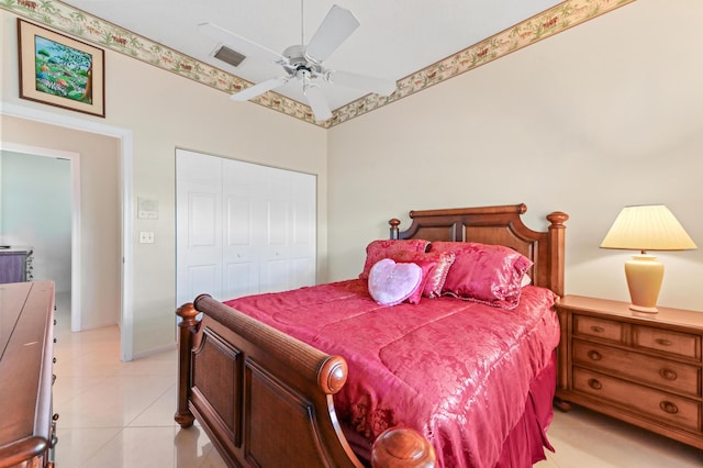 4346 Danielson Dr, Lake Worth, FL 33467 - bedroom featuring a closet, a ceiling fan, and light tile patterned flooring