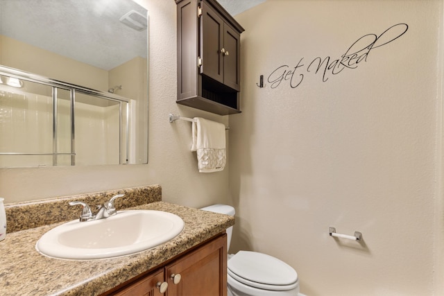6102 NW Painted Bunting Ct, Port Saint Lucie, FL 34986 - bathroom featuring vanity, toilet, and a shower stall