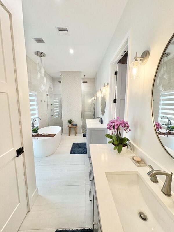 9600 Payton Ct, Boynton Beach, FL 33472 - bathroom featuring a shower stall, tile patterned floors, vanity, a freestanding bath, and recessed lighting