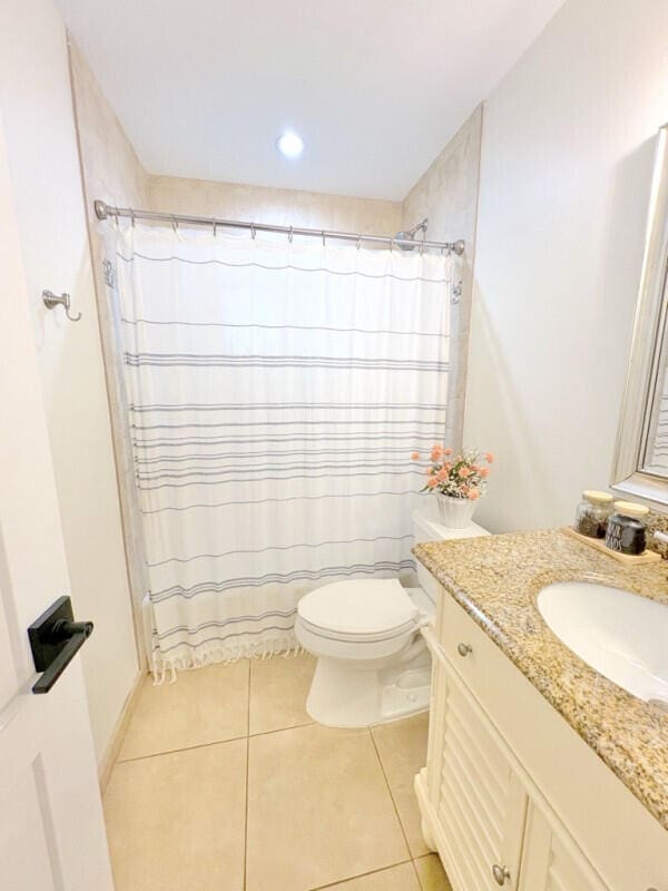 9600 Payton Ct, Boynton Beach, FL 33472 - bathroom featuring vanity, toilet, tile patterned flooring, a shower with curtain, and recessed lighting