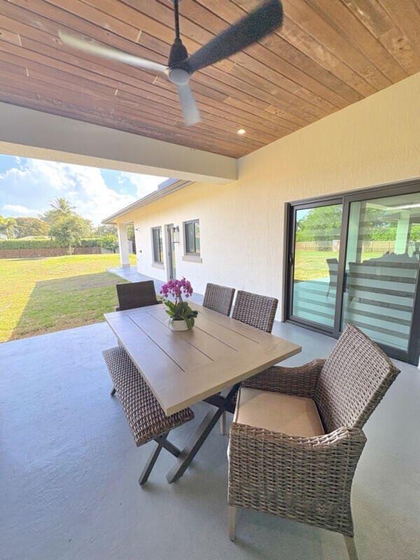 9600 Payton Ct, Boynton Beach, FL 33472 - view of patio featuring ceiling fan and outdoor dining area