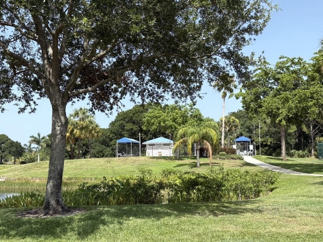 9600 Payton Ct, Boynton Beach, FL 33472 - view of grassy yard featuring view of scattered trees