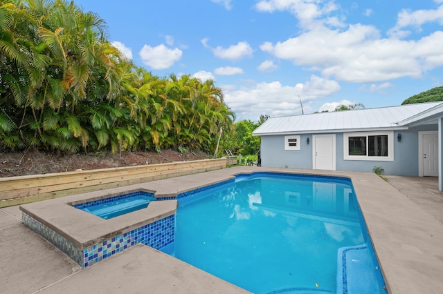 6008 S Citrus Ave, Fort Pierce, FL 34982 - swimming pool with an in-ground hot tub and a patio area