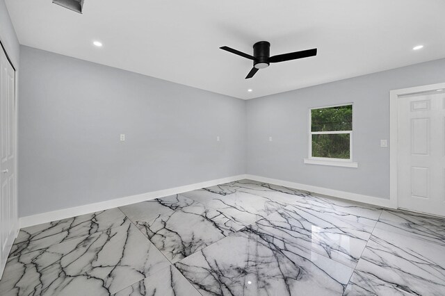 6008 S Citrus Ave, Fort Pierce, FL 34982 - unfurnished room with marble finish floors, ceiling fan, and recessed lighting