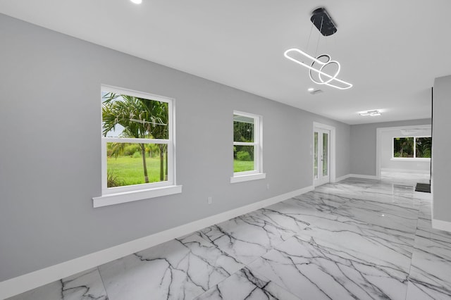 6008 S Citrus Ave, Fort Pierce, FL 34982 - unfurnished room featuring marble look tiles and baseboards