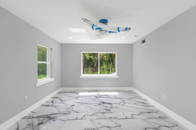 6008 S Citrus Ave, Fort Pierce, FL 34982 - empty room featuring marble finish flooring and recessed lighting