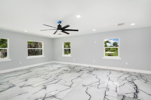 6008 S Citrus Ave, Fort Pierce, FL 34982 - empty room with recessed lighting, a ceiling fan, and marble finish flooring