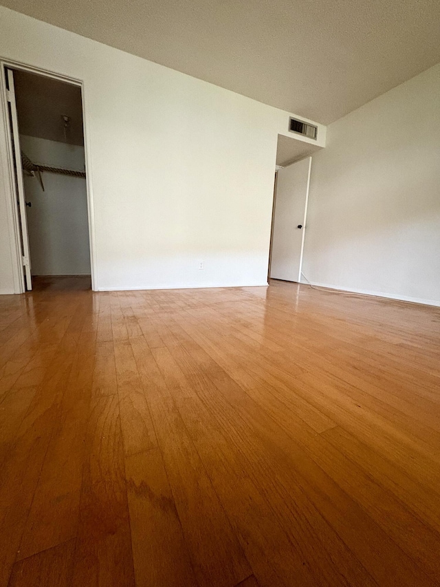 2540 Boundbrook Blvd Unit 110, Palm Springs, FL 33406 - empty room with light wood-style floors
