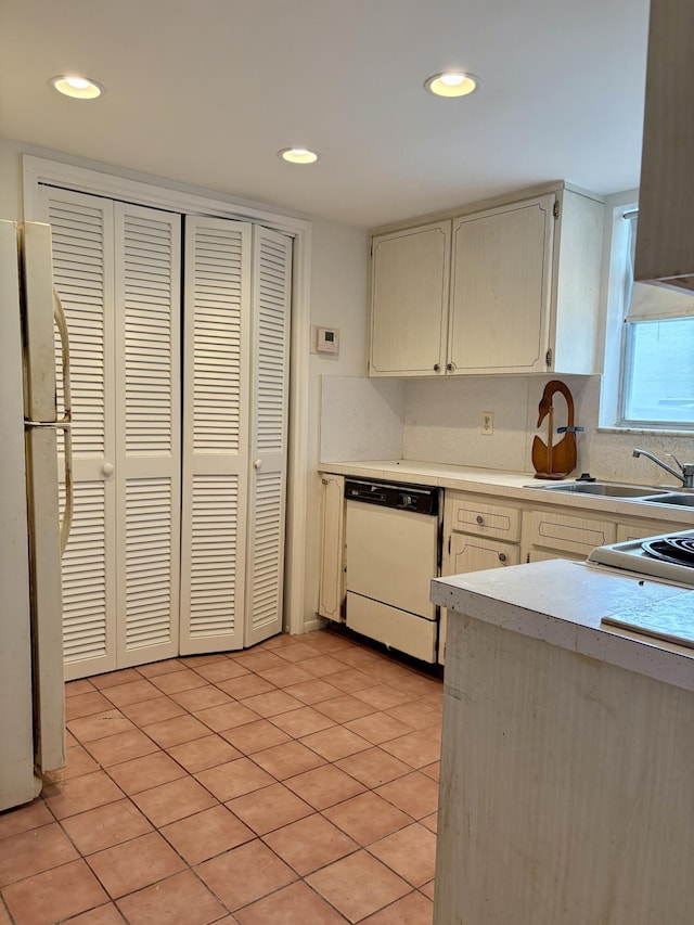 2540 Boundbrook Blvd Unit 110, Palm Springs, FL 33406 - kitchen featuring white appliances, light countertops, recessed lighting, light tile patterned floors, and tasteful backsplash