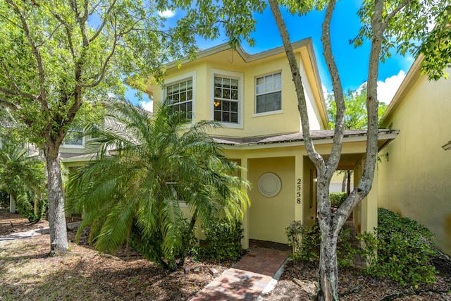 2558 SE Pineland Dr, Port Saint Lucie, FL 34952 - view of front of property with stucco siding