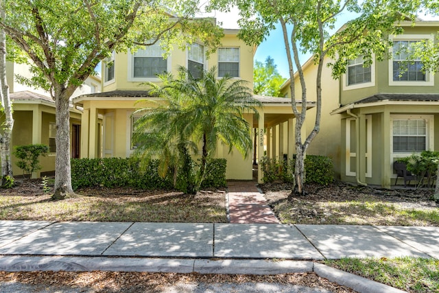 2558 SE Pineland Dr, Port Saint Lucie, FL 34952 - view of front of property featuring stucco siding