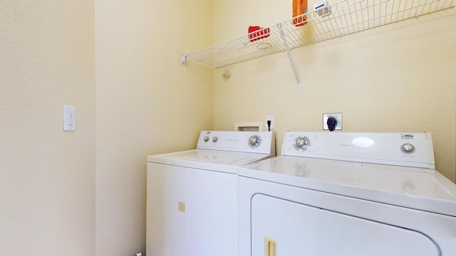 2558 SE Pineland Dr, Port Saint Lucie, FL 34952 - washroom with washer and clothes dryer and laundry area