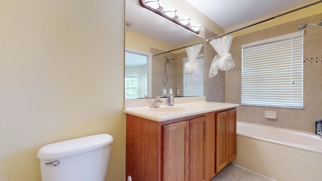 2558 SE Pineland Dr, Port Saint Lucie, FL 34952 - bathroom featuring a tub to relax in, vanity, tile patterned flooring, toilet, and curtained shower