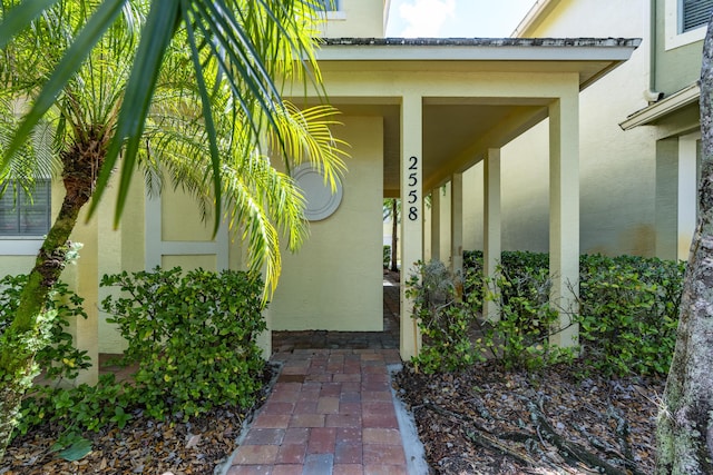 2558 SE Pineland Dr, Port Saint Lucie, FL 34952 - entrance to property with stucco siding