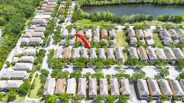 2558 SE Pineland Dr, Port Saint Lucie, FL 34952 - drone / aerial view with a water view and a residential view