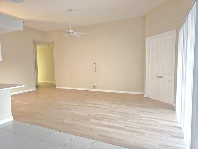 10902 SW Blue Mesa Way, Port Saint Lucie, FL 34987 - unfurnished living room with ceiling fan and light wood-style flooring