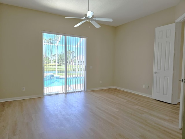 10902 SW Blue Mesa Way, Port Saint Lucie, FL 34987 - spare room with healthy amount of natural light, light wood-style flooring, and a ceiling fan