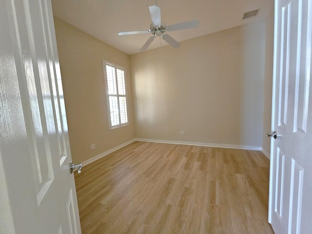 10902 SW Blue Mesa Way, Port Saint Lucie, FL 34987 - spare room featuring light wood-style floors and ceiling fan