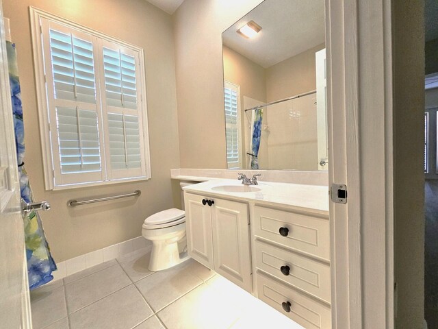 10902 SW Blue Mesa Way, Port Saint Lucie, FL 34987 - bathroom with tile patterned flooring, vanity, and a shower with curtain