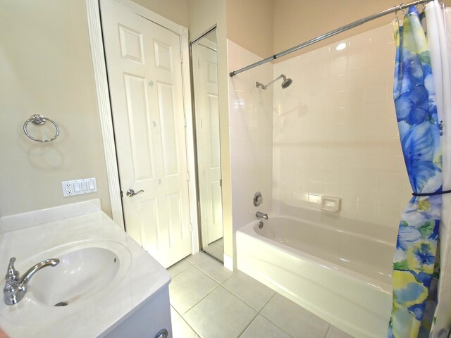10902 SW Blue Mesa Way, Port Saint Lucie, FL 34987 - full bathroom featuring shower / bath combination with curtain, tile patterned flooring, and vanity