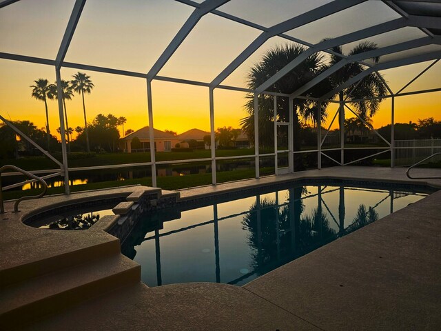 10902 SW Blue Mesa Way, Port Saint Lucie, FL 34987 - view of pool featuring a lanai, a patio, and a pool with connected hot tub