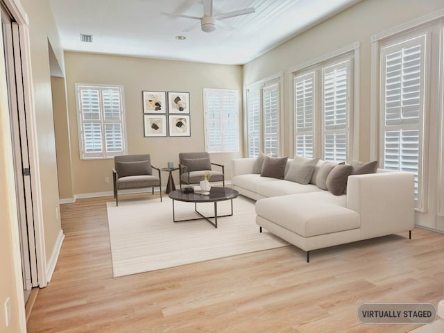 10902 SW Blue Mesa Way, Port Saint Lucie, FL 34987 - living room featuring ceiling fan, light wood-type flooring, and plenty of natural light