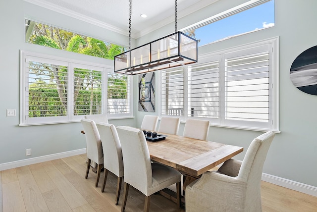 10740 Grande Blvd, West Palm Beach, FL 33412 - dining room featuring baseboards, ornamental molding, wood finished floors, and recessed lighting