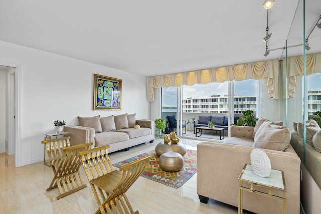 2773 S Ocean Blvd Unit 407, Palm Beach, FL 33480 - living room featuring rail lighting