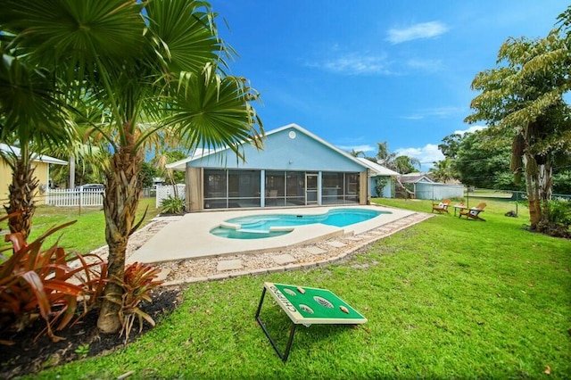 870 SW Gardens Blvd, Palm City, FL 34990 - view of pool with a yard, a fenced in pool, a sunroom, and a fenced backyard