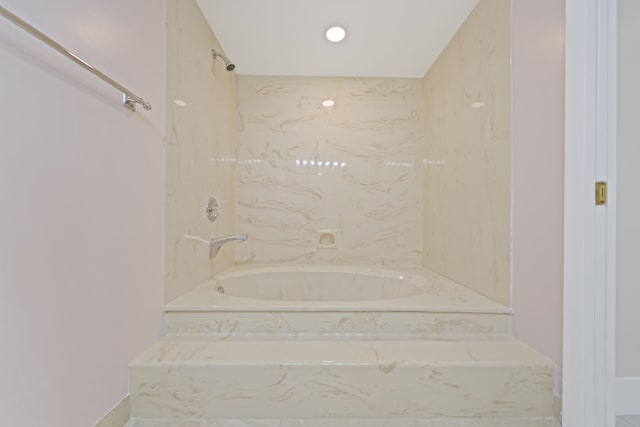 bathroom with a combined bath / shower with marble appearance