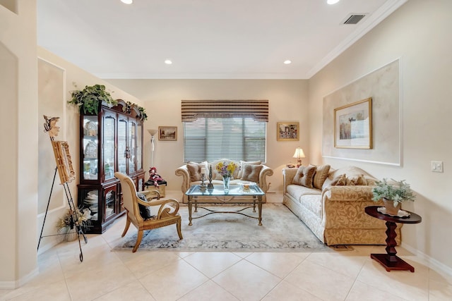 living room with light tile patterned floors, baseboards, ornamental molding, visible vents, and recessed lighting
