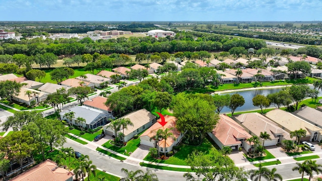 aerial view featuring a residential view and a water view