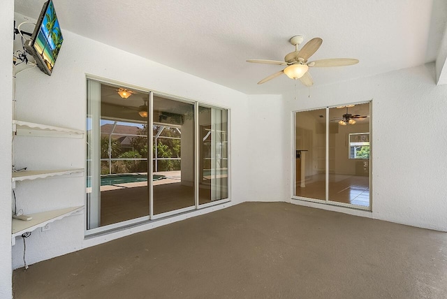 view of patio with a ceiling fan