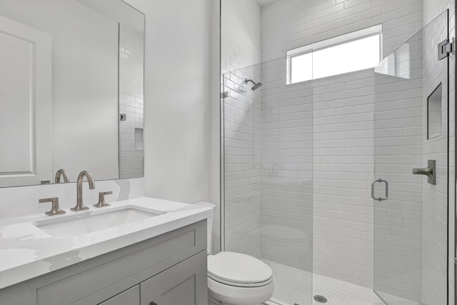 130 SE Palma St, Port Saint Lucie, FL 34984 - full bath featuring toilet, a stall shower, and vanity